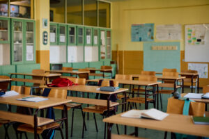 Empty clean classroom promoting Jani King cleaning services